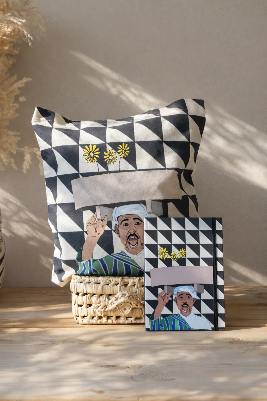 ethnik Morocco pillow and notebook with geometric pattern and illustrated man in traditional attire