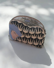 ethnik Moroccan pouch with geometric black pattern and original illustrated face, zippered