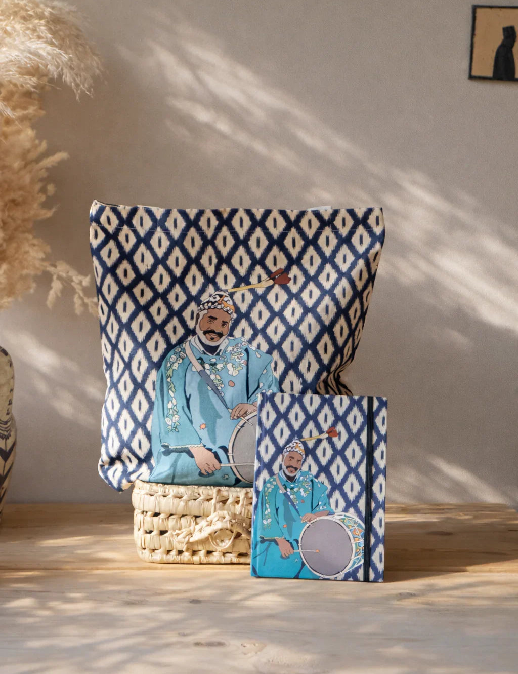 Moroccan stationery set with blue diamond pattern and illustrated drummer pouch and notebook by ethnik