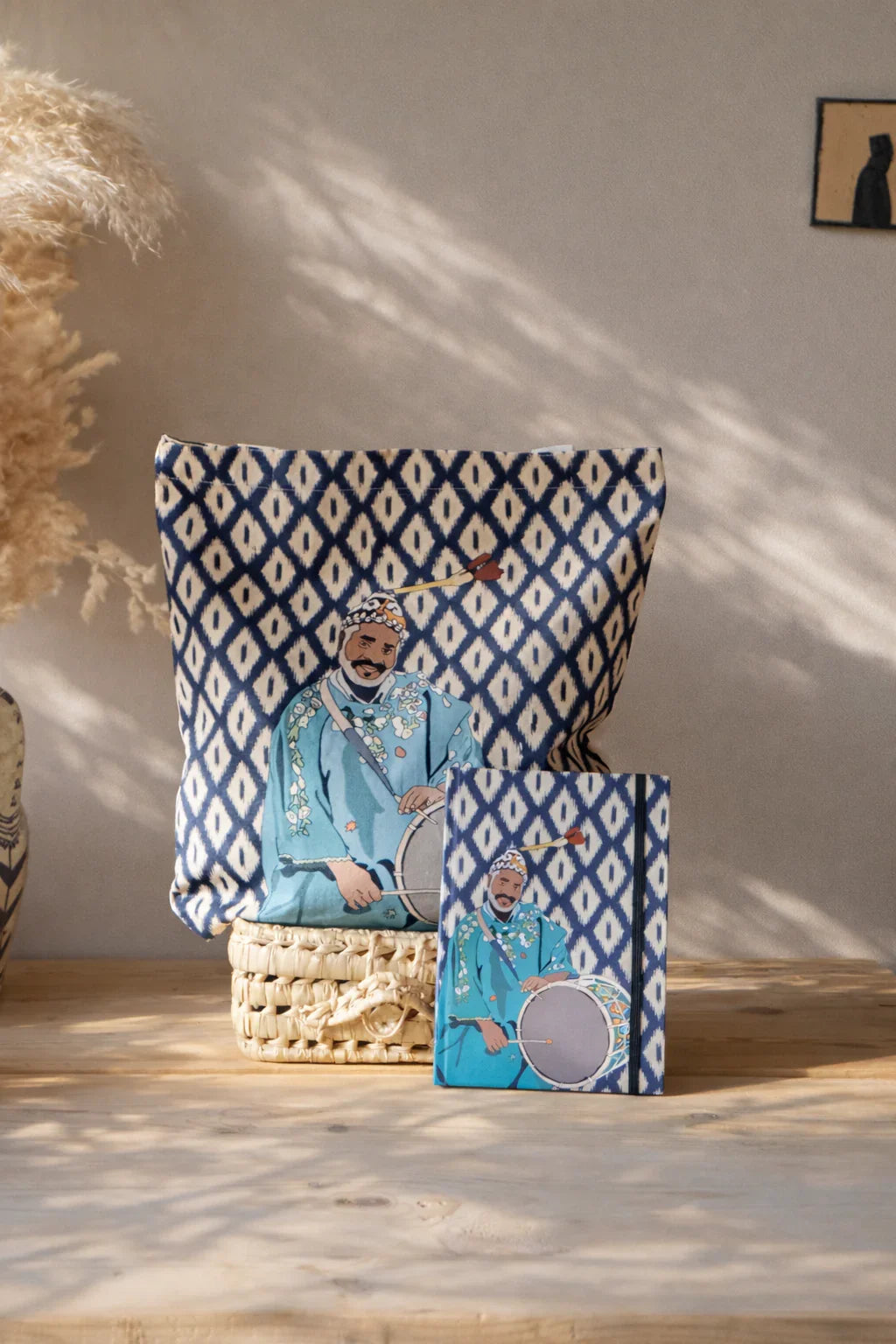 Moroccan stationery set with blue diamond pattern and illustrated drummer pouch and notebook by ethnik