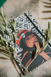 ethnik Moroccan illustrated notebook on patterned cover with olive branches