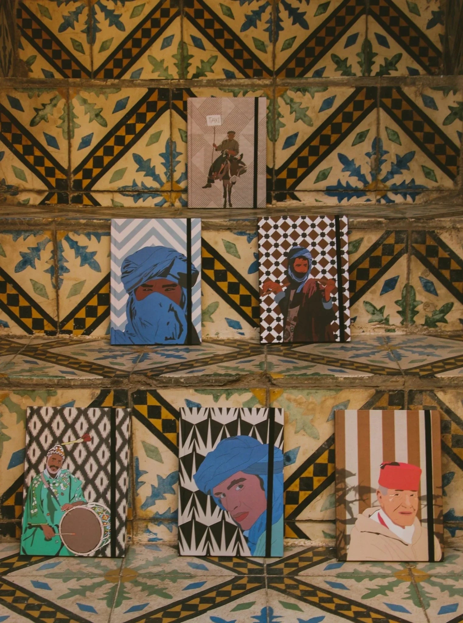 Ethnik Moroccan illustrated notebooks on patterned tiled stairs, unique stationery and accessories