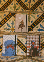 Ethnik Morocco illustrated notebooks with traditional covers on Moroccan tile background