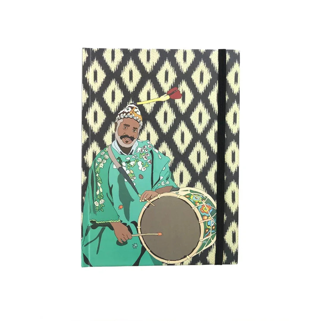 Ethnik Moroccan notebook with illustrated drummer in traditional green attire and patterned cover