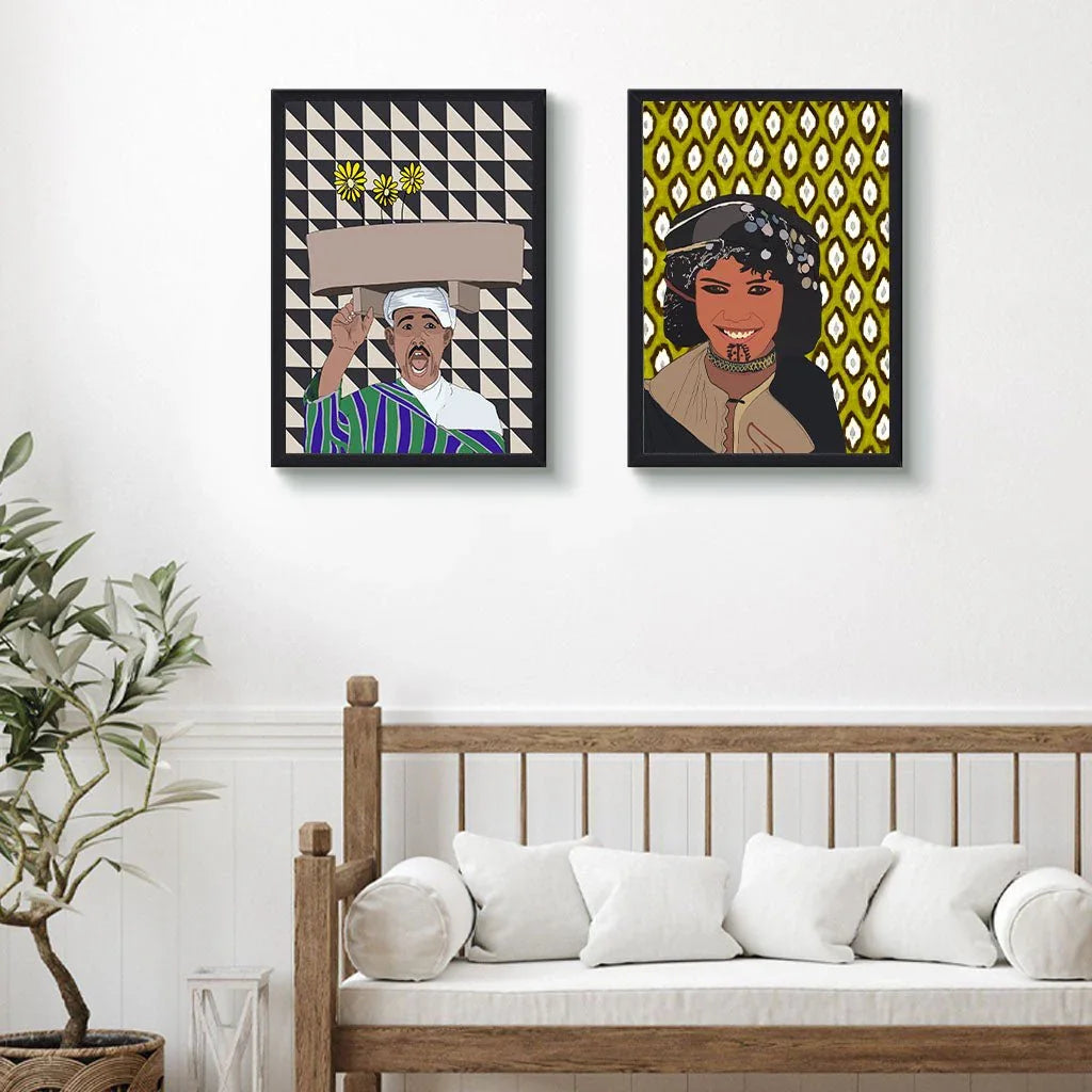 Two framed Moroccan-style art prints with original illustrations hanging above a wooden sofa.