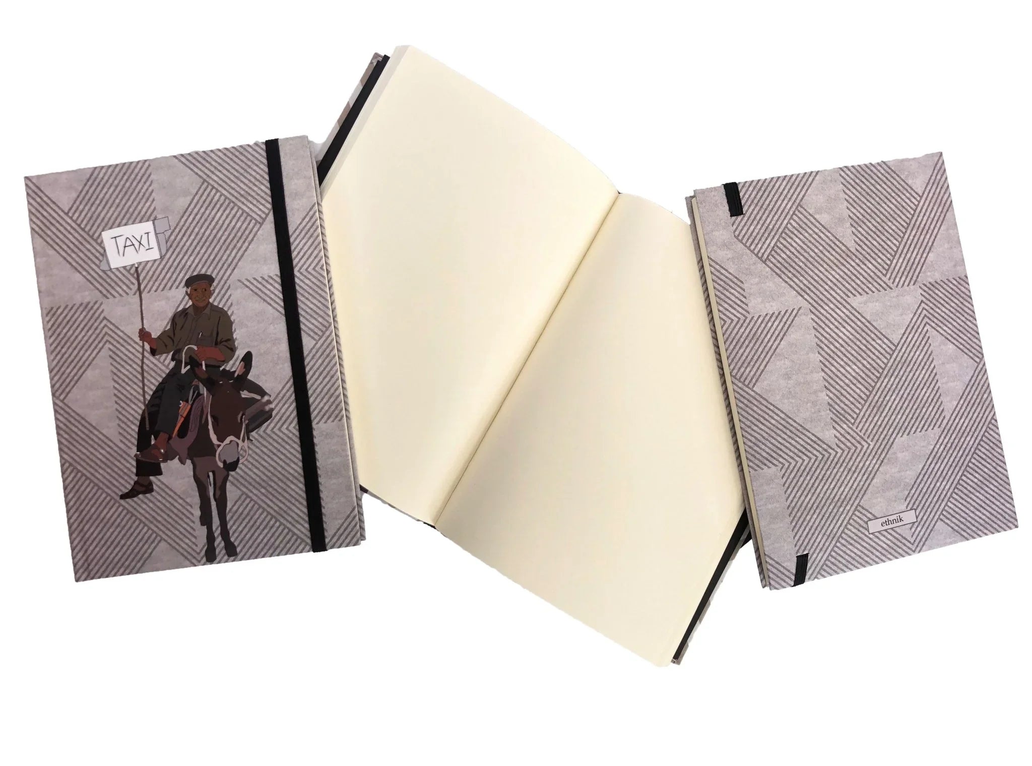 Ethnik Moroccan stationery notebooks with geometric covers, one featuring a man on a donkey holding a taxi sign, open and closed display.