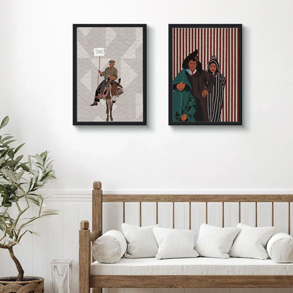 Two framed Moroccan art prints with original illustrations on a white wall above a sofa.
