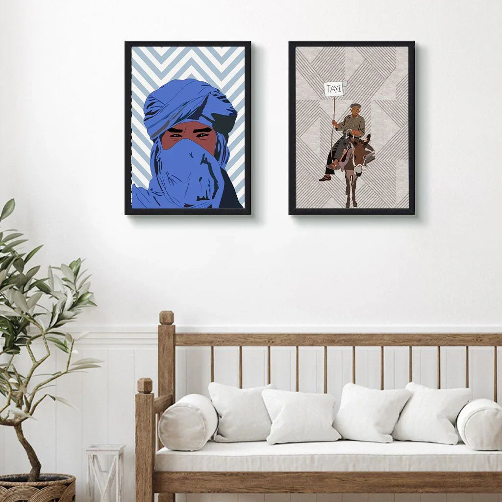 Moroccan-inspired wall art above a wooden couch, featuring a blue-turbaned figure and a donkey rider illustration, ethnik stationery & accessories home decor